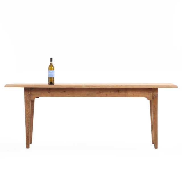 This wonderful table has a long rectangular top with molded edge, supported by four square tapering legs. Perfect as a...