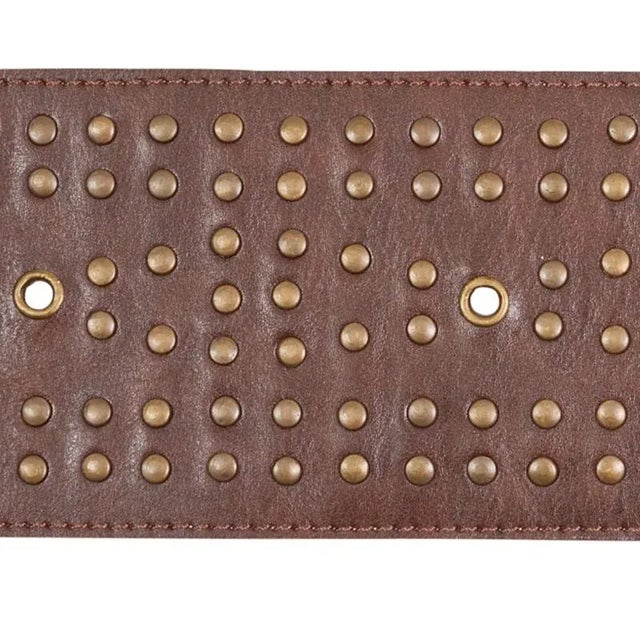 With its refined, geometric pattern articulated in brass rivets, this embellished leather trim adds a sophisticated and...