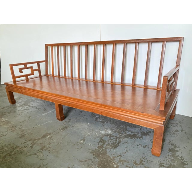 This is an absolutely gorgeous solid walnut sofa. It is in an Asian style possibly from Asia itself. It has hand car...