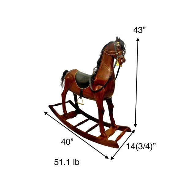 Vintage rocking horse toy is a beautiful addition to any home decor with its intricate brass, leather, and hair accents....