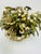 This is a vintage Jane Hutchinson decorative floral arrangement featuring handcrafted metal flowers and leaves in a...