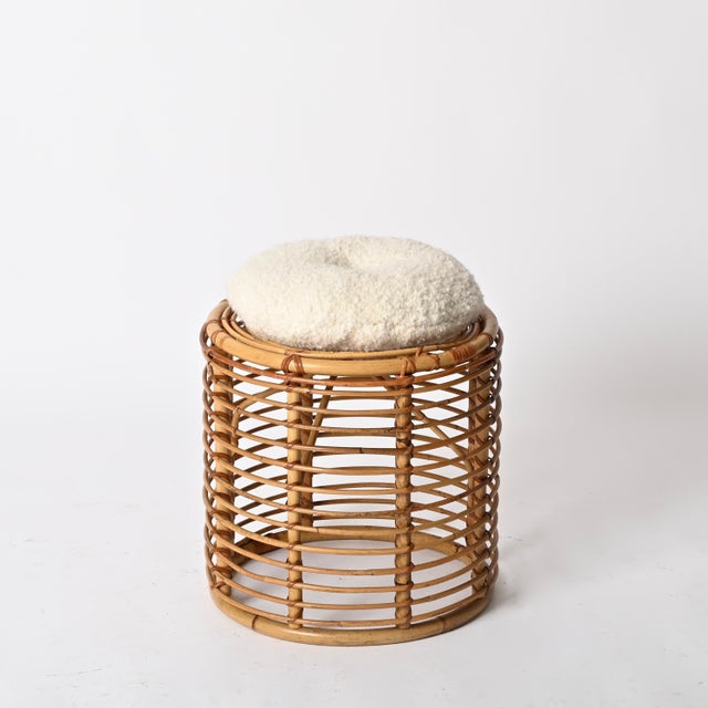 Gorgeous Mid-Century organic pouf or side table, fully made of curved rattan and hand-woven wicker. This stylish French...