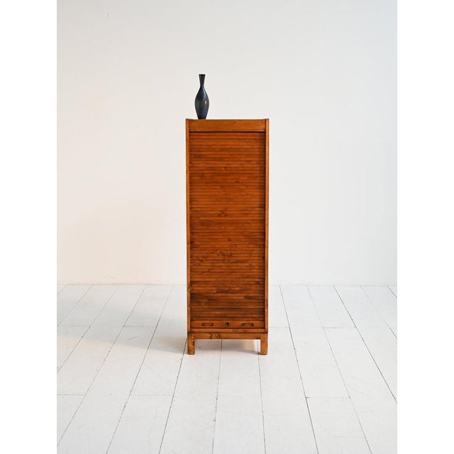 Birch wardrobe with tambour door and compartmentalized interior. Scandinavian production, first half of the 20th century....