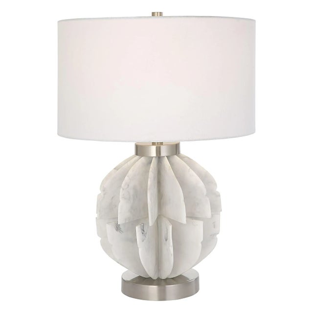 This Contemporary Table Lamp Features Thin Stacked Blades That Create An Organic Sphere Finished In A White Marble Look...