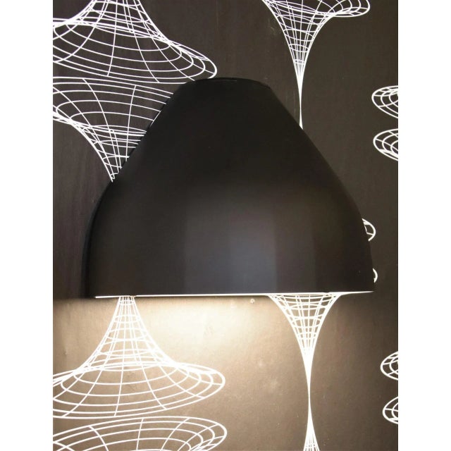 Le Klint Facet Wall lamp for both outdoor and indoor use. Design Aurélien Barbry. The wall lamp is IP44 certified and can...