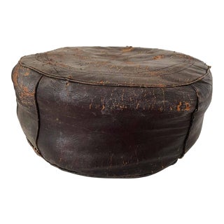 Late 20th Century Vintage Distressed Leather Round Ottoman For Sale