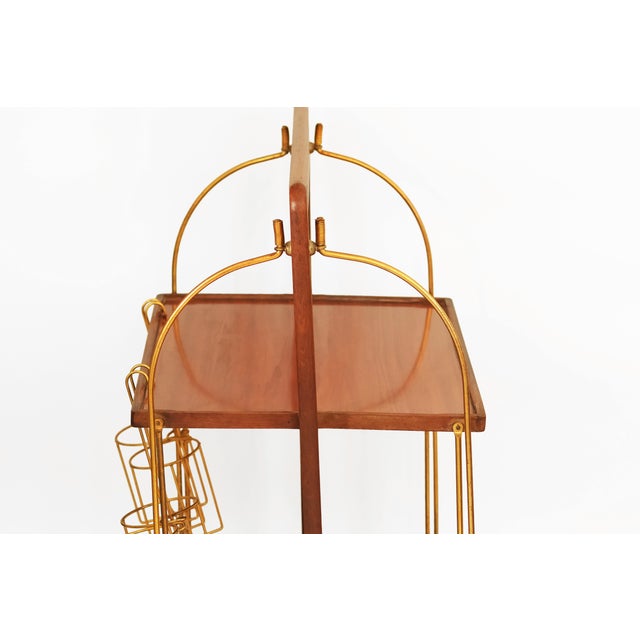 Elegant French vintage folding serving cart designed by Marie-Françoise Mondineu, featuring a sophisticated combination of...