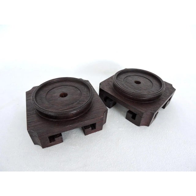 We were pleased to find a pair of identical lamp bases or vase display stands/pedestals! Ming in style, with turned round...