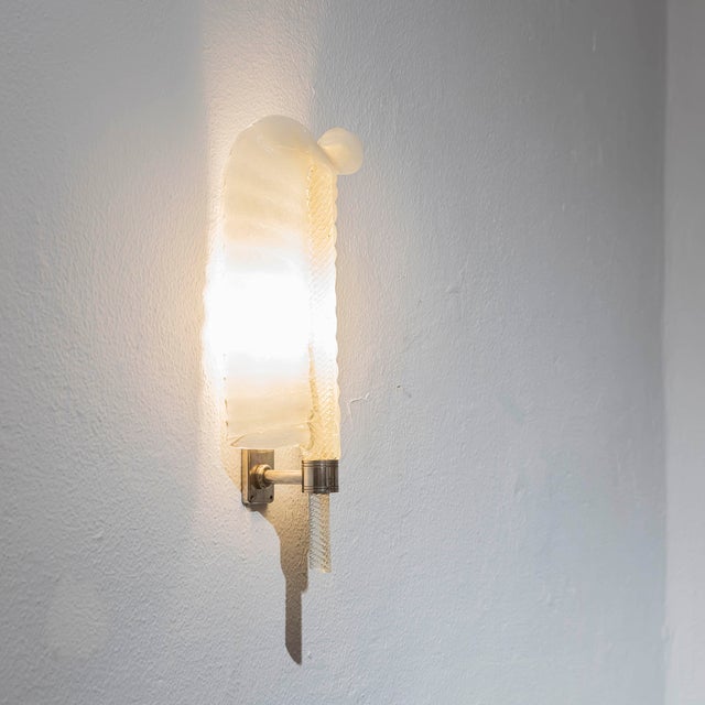 Murano Glass Leaf Wall Light attributed to André Arbus for Barovier & Toso, 1950s, in Good conditions. Designed 1950 to...