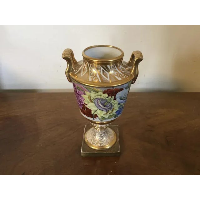 Antique early 19th c. English Regency Coalport porcelain vase. Decorated with a continuous floral scene in the round...