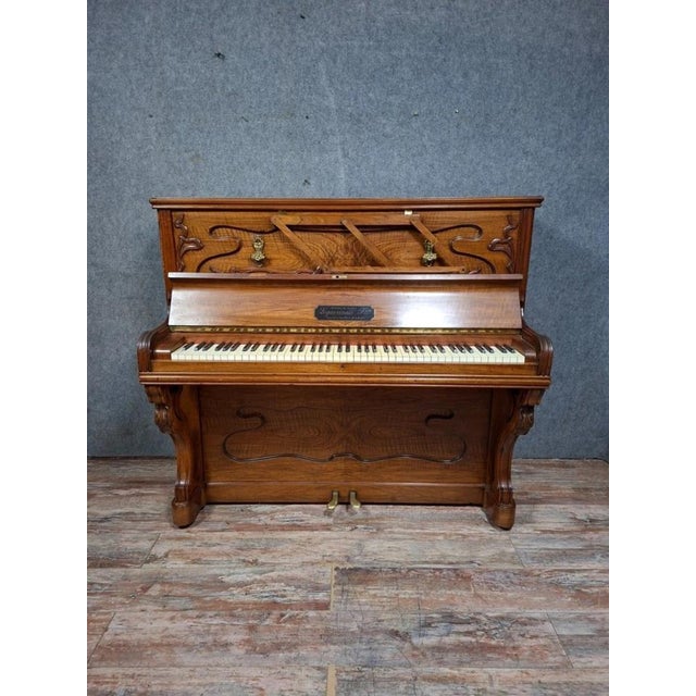 Elegant art nouveau upright piano, made around 1900 by the french manufacturer p. Charuis. this remarkable piece is...