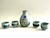 Serve sake in style with this vintage Japanese ceramic decanter and cup set. Made in Japan, the ceramic sake serving set...