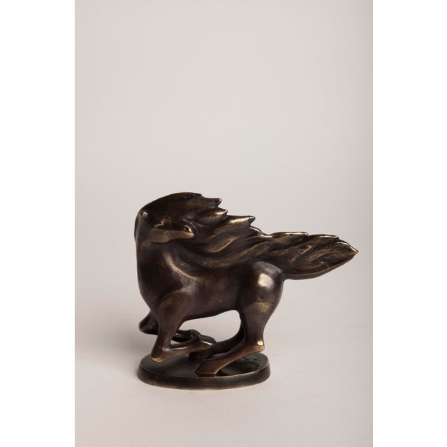 "Horse" An Art Deco–style animal bronze of a horse in motion, head tossed and mane and tail streaming back as if caught in...