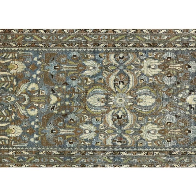This Semi Antique Persian Melayer Runner is handwoven in Iran's Hamadan region and carefully distressed and restored in...