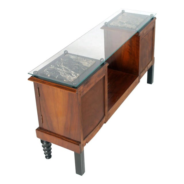 This is a 1920s Art Deco entrance cabinet console in burl walnut and ebonized walnut. It has black marble with white veins...