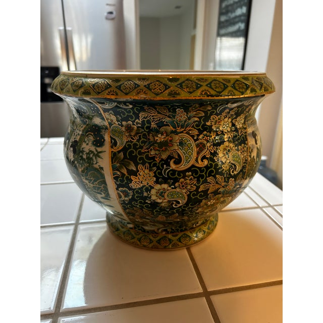 Mid Century to Late 20th Century East Asian, porcelain or ceramic planter/cachepot with tall pedestal. Green floral...