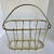 Here is a fabulous magazine/book rack that is designed with lovely round edges and curves. I adore the shape of the handle...