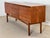 Stunning and unusual mid-century sideboard designed by Tom Robertson for cabinetmaker A.H. McIntosh in Scotland for the...