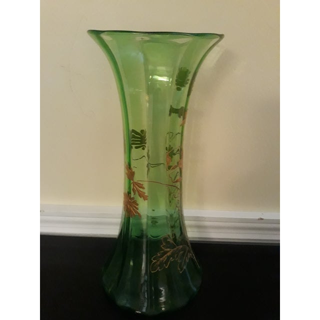 This beautiful green glass vase with gold, hand-painted design was received as a wedding gift in the 50's. It is in...
