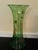 This beautiful green glass vase with gold, hand-painted design was received as a wedding gift in the 50's. It is in...