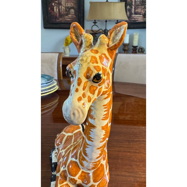 Giraffe Vintage handcrafted Glazed terracotta sculpture of a seated giraffe. Made inITALY RARE Add fun and whimsy to a...