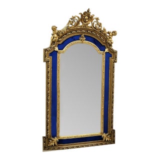 Grand French Baroque Wall Mirror With Royal Blue Velvet Panels, Cherub Crest & Gilded Frame For Sale