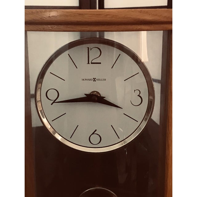 1980s Howard Miller Oak Clock With Brass Pendleton OffWhite Dial Works