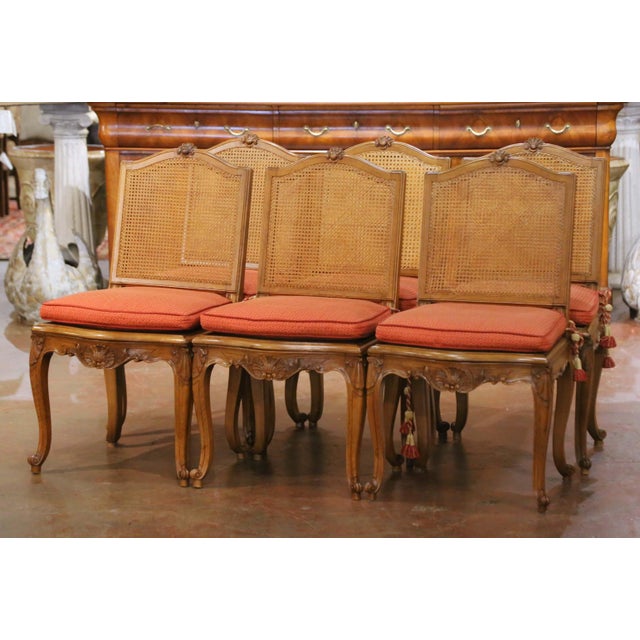 Bring refined provincial elegance to a dining room, breakfast room, or kitchen with this set of six antique beechwood cane...