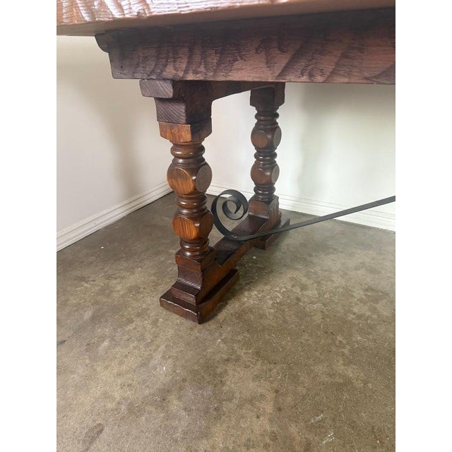Oxblood Red Monumental Spanish Revival Style Walnut Trestle Dining Table With Hand-Hewn Top For Sale - Image 8 of 8