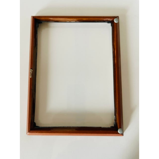 Antique 800silver picture photo frame with floral hand cased decoration in the corners, outside dimensions 8” by 11”,...