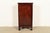 A beautiful antique American Empire or Victorian style music cabinet or bar cabinet USA, Circa 1890s Carved mahogany, with...