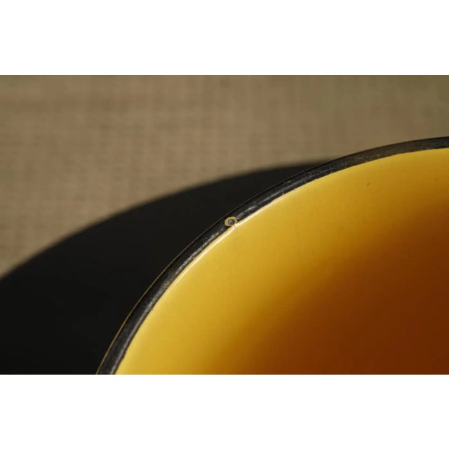This charming mid-century enamelware wash set is a vibrant tribute to the decorative housewares of the 1950s to 1960s....
