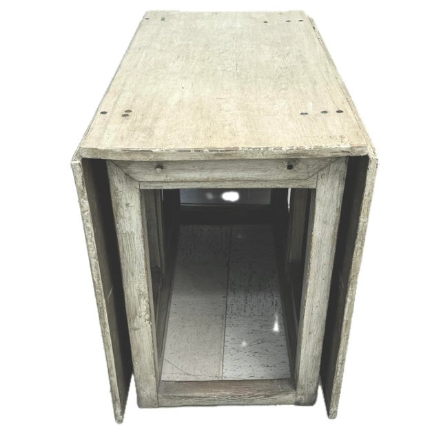 19th Century Swedish painted drop-leaf table. Table features two large leaves that drop down when not needed, making this...