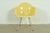 An iconic Mid-Century Modern DAX arm chair By Charles Eames for Herman Miller USA, Circa 1950s Yellow fiberglass, with...