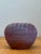 This captivating vintage studio pottery vase is an exquisite example of organic modernism, featuring a squat, globe-like...