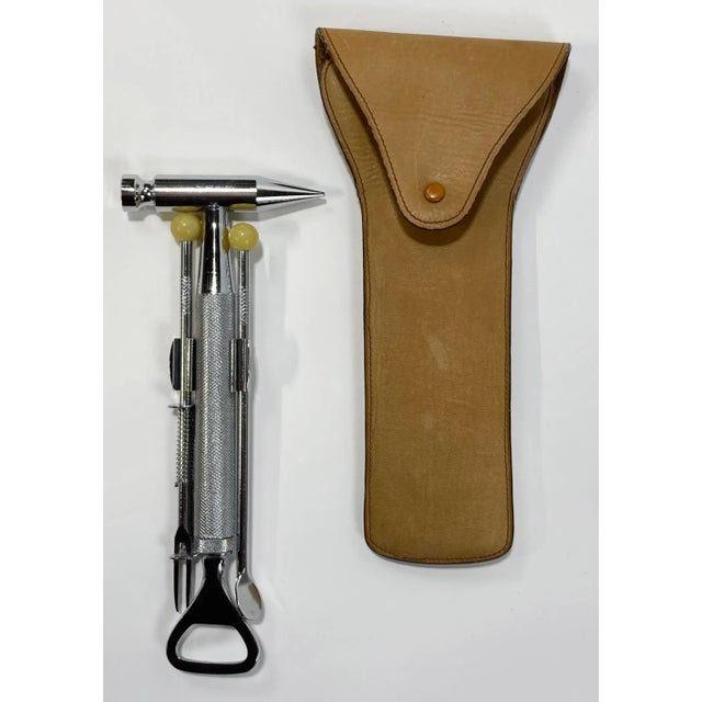 Unique vintage bar tool set incorporating three individual stainless steel pieces into a supple leather Loewe 1848 pouch....