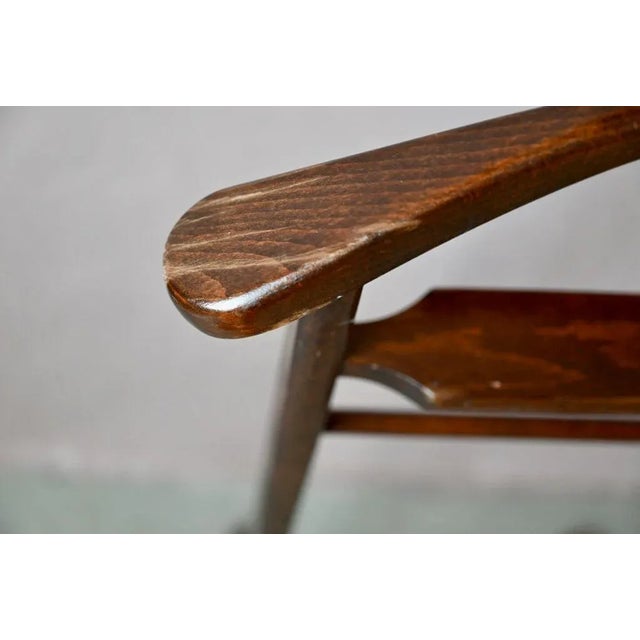 Always useful and ready to help, this charming clothes rack or valet stand is a very practical vintage piece. Made of...