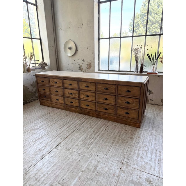 Antique and very large 1900s shop cabinet, typical of a confectioner's or seed merchant's cabinet. we love its 280cm...