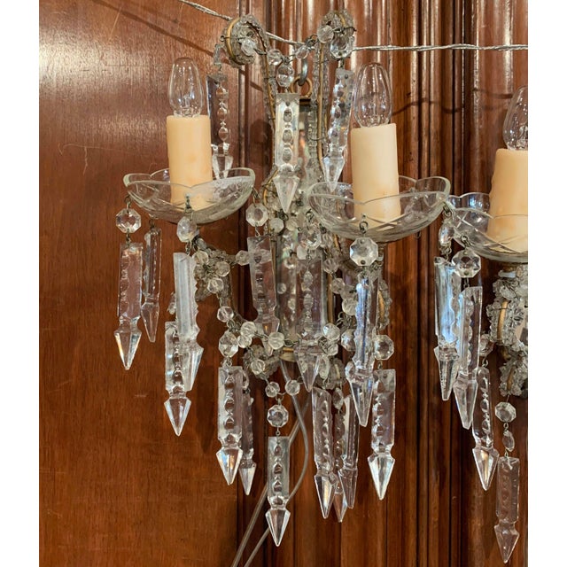 Sparkling cut-glass decoration gives this pair of antique wall sconces an elegant and romantic presence. Crafted in Italy...