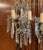 Sparkling cut-glass decoration gives this pair of antique wall sconces an elegant and romantic presence. Crafted in Italy...