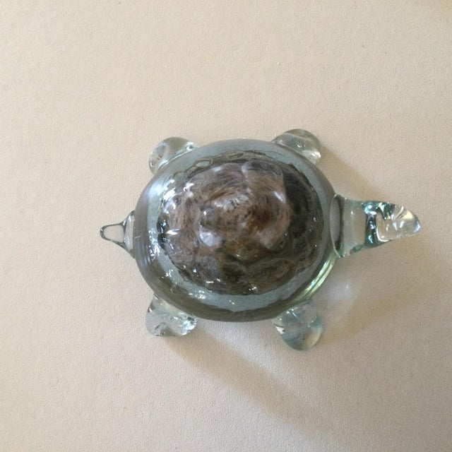 Glass sculpture of a sand-hearted turtle. This unique 9cm piece demonstrates a complex mastery of glass. Blown in several...
