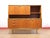 A stunning tall credenza by renowned furniture maker Austinsuite, this Mid Century Modern Vintage Teak Tall Credenza...