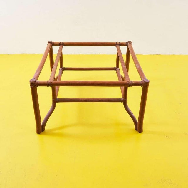 This refined pair of bamboo coffee tables is a testament to 1980s italian design. Each table features a lightweight yet...