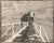1930s sepia tone photograph of a man climbing the ladder of an old fire engine. Unsigned, with a blank back. Combined...
