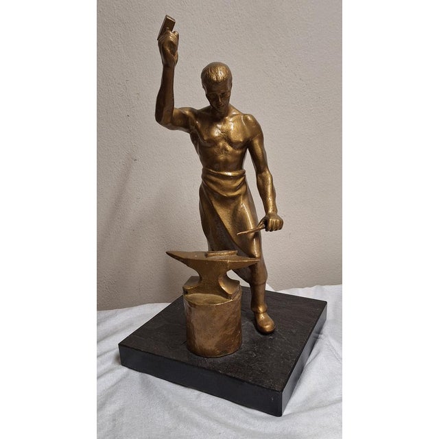Blacksmith Sculpture Metal on Black Slate Plate, 1920s, in Good conditions. Designed 1920 to 1949