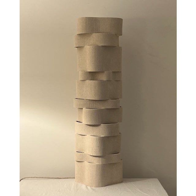 The TOO 60 Floor Lamp is a sculptural ceramic lighting piece handcrafted in stoneware, this luminous sculpture stands as...