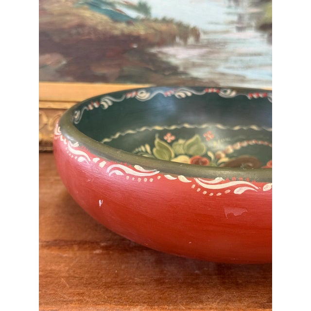 This beautiful vintage wooden bowl showcases traditional Norwegian Rosemaling Style— a folk art painting style known for...