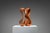 This vintage abstract sculpture is hand-carved from warm-toned teak wood and defined by a highly fluid, organic form. The...