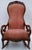 This is a beautifully made and super comfortable antique rocking chair, reupholstered around 2000 with a sturdy...