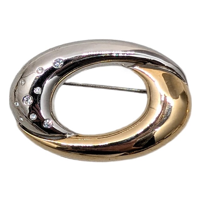 Vintage 1980s Signed Courreges Paris Rhodium Plate & Goldtone Clear Rhinestone O Brooch For Sale